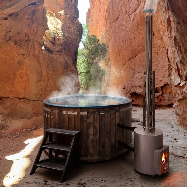 Wooden hot tub DIANA by Makoya Spa stands in a narrow canyon with red rock walls in a natural setting